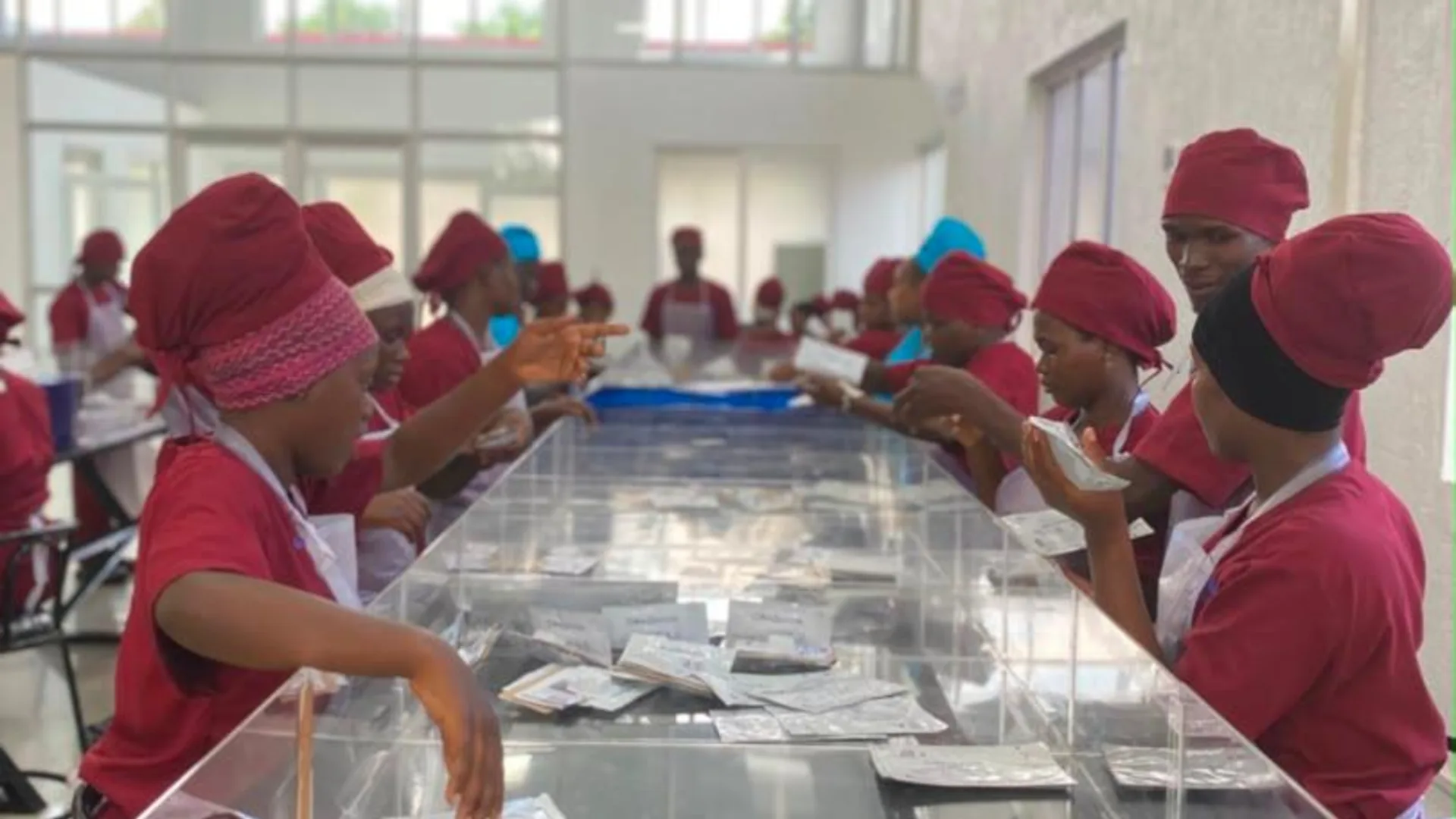 Zakayo production line with team members packaging diagnostic products